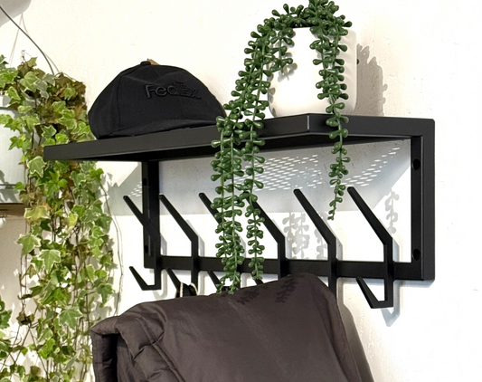 Front view in interior of Steel coat & hat rack with shelf