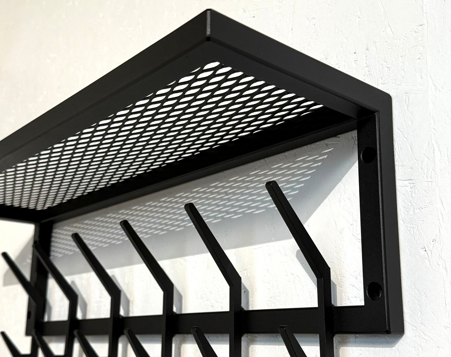 Close-up of Steel coat & hat rack with shelf