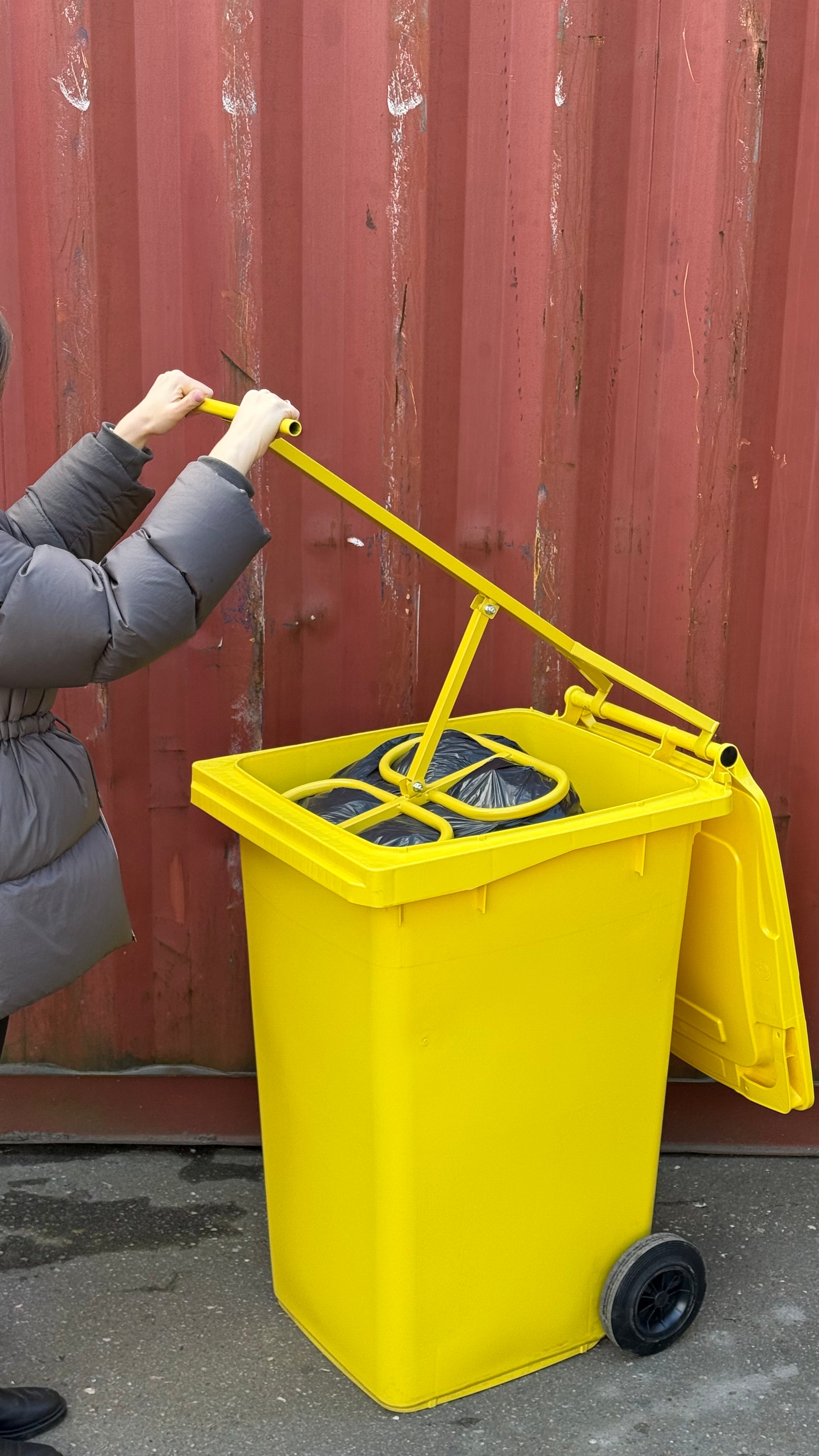 Side view with yellow Manual Metal Trash Compactor - PRESS