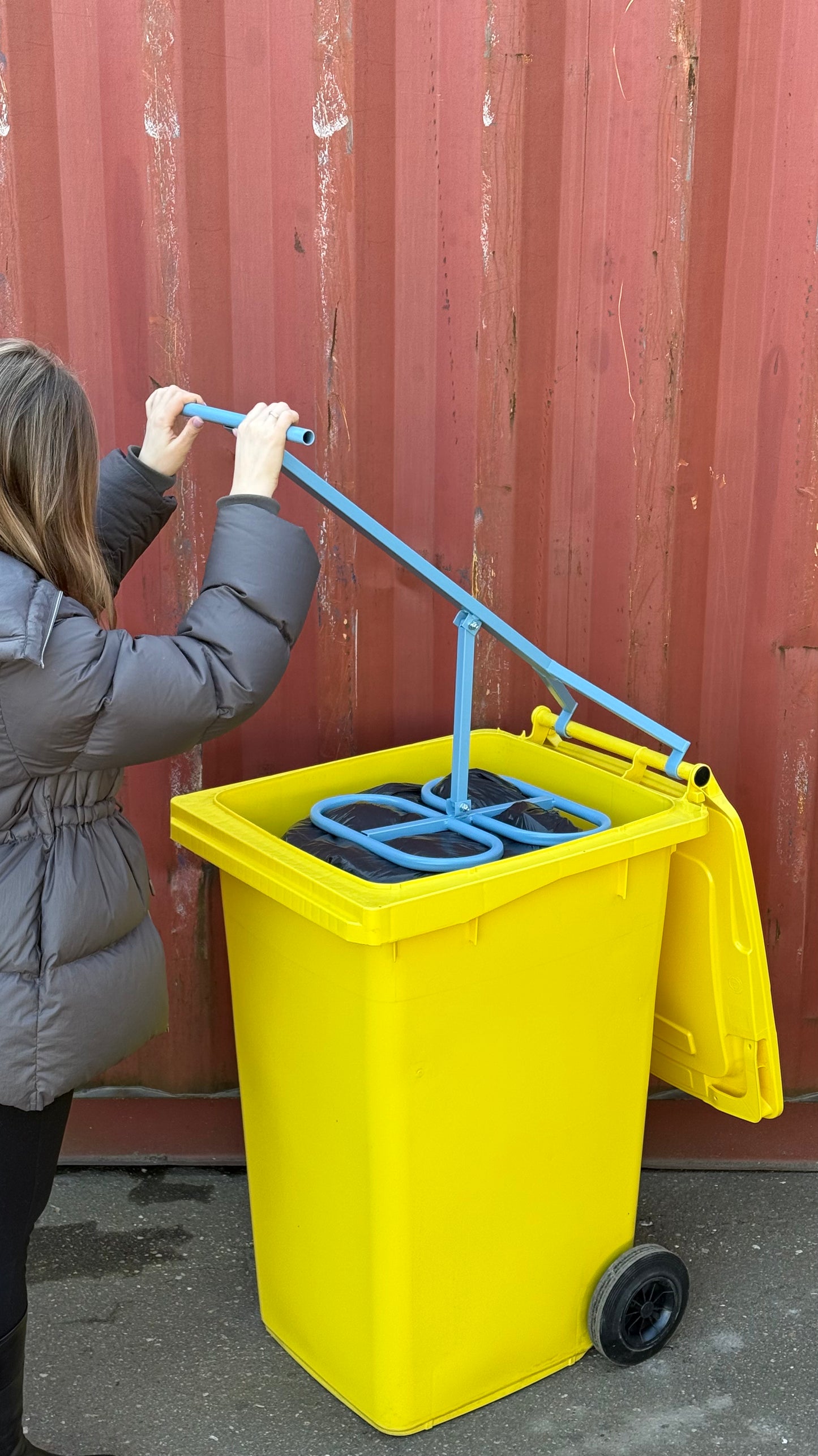 Side view with blue Manual Metal Trash Compactor - PRESS