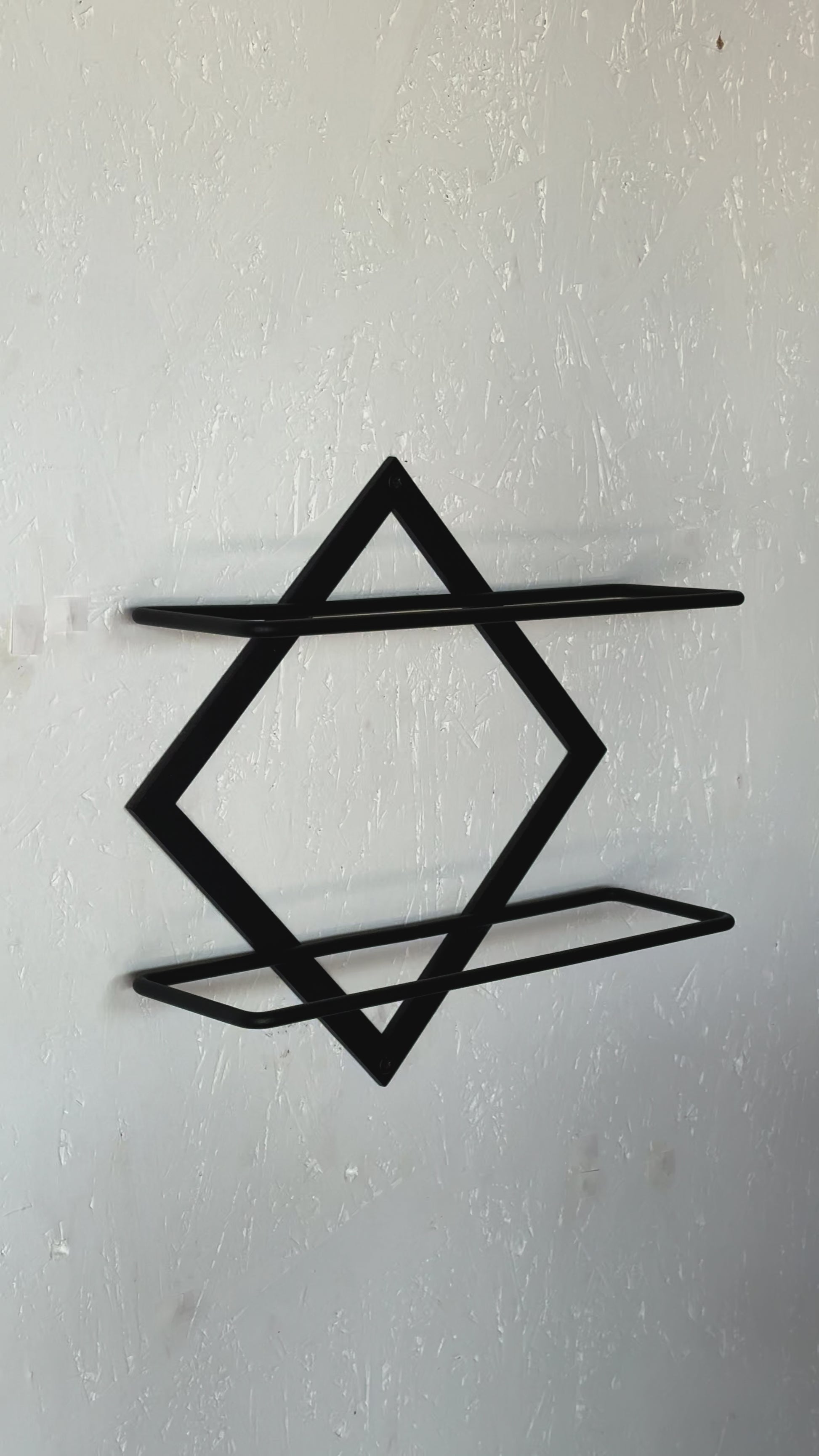Video of wall-mounted metal wine bar shelf