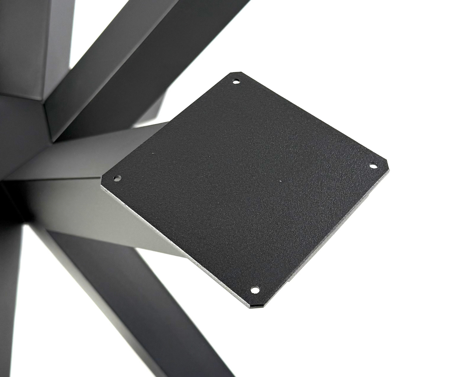 Close-up with top plate of Spider style dining table base