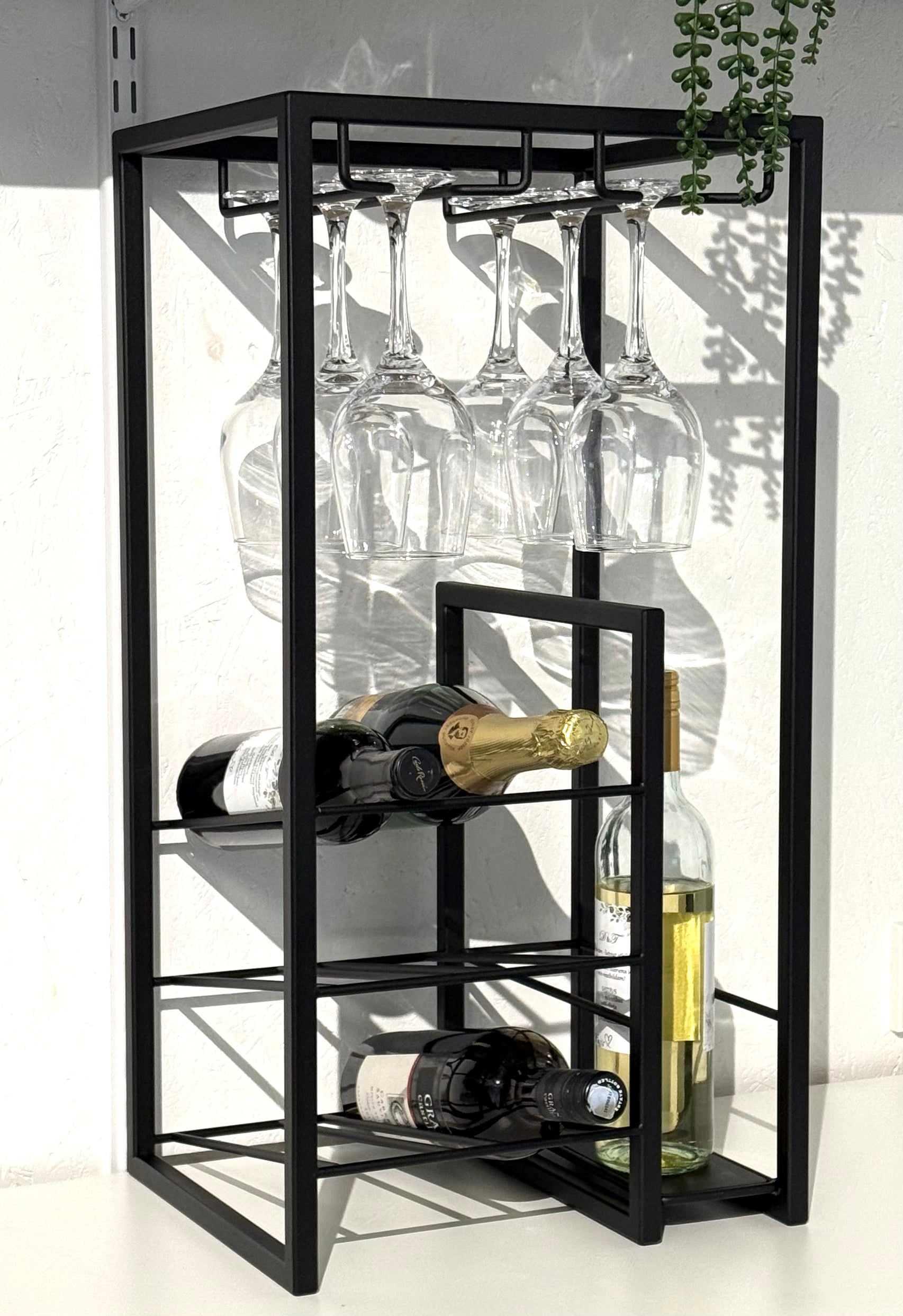 Front view with wine bottles and wine glasses in interior of Free Standing Wine Rack 