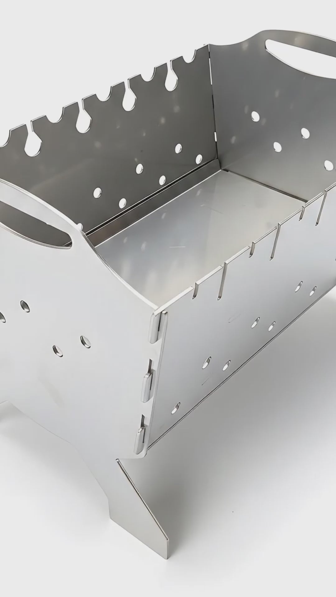Video view of portable stainless steel mangal grill showing